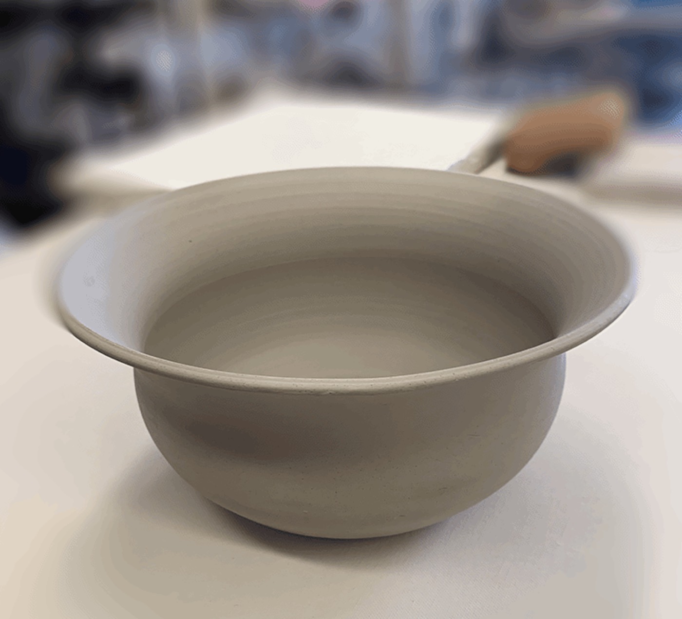 Unglazed hand-thrown ceramic bowl