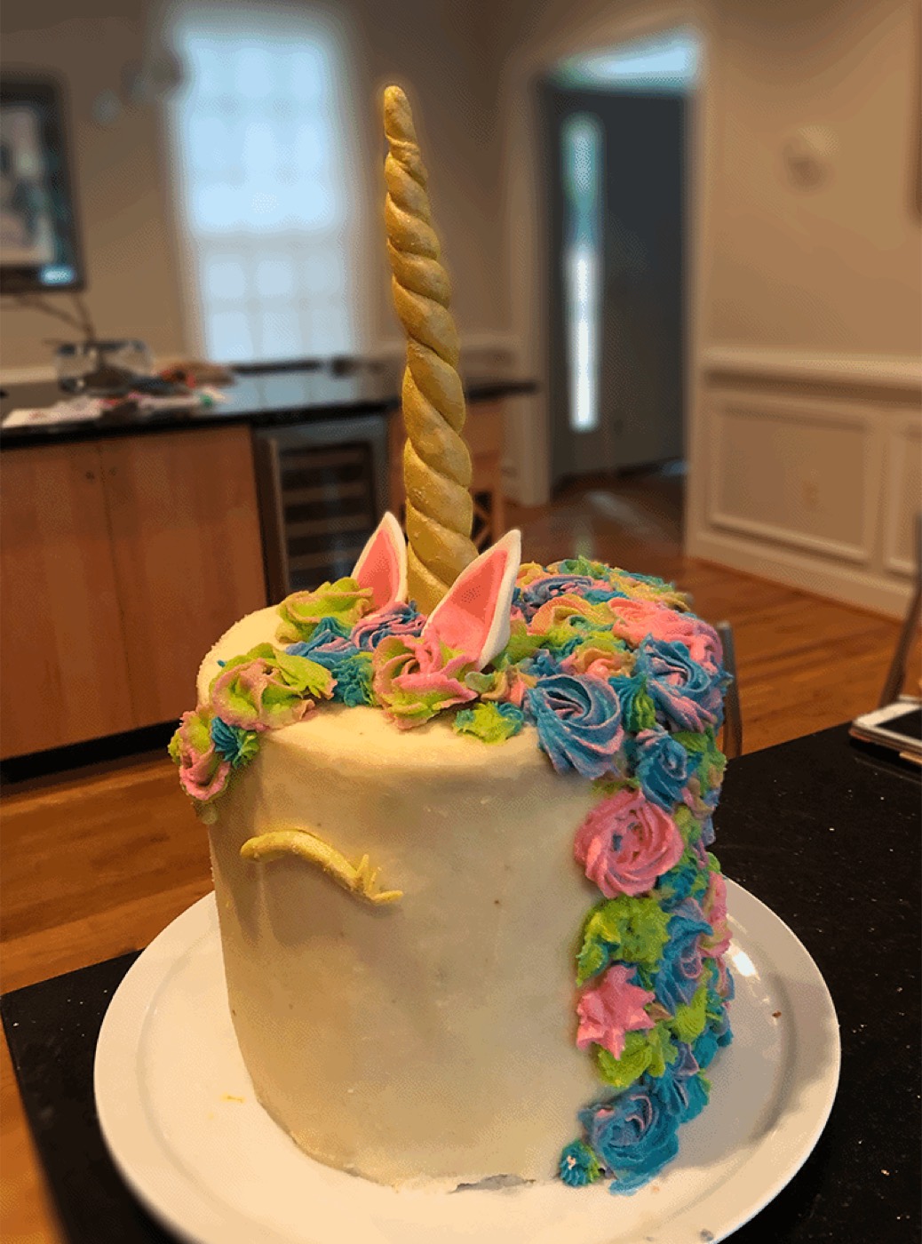 Unicorn-themed buttercream layer cake